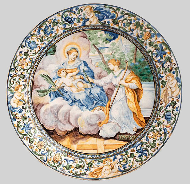 Ozdobny talerz ze sceną adoracji Marii z Dzieciątkiem przez św. Martynę