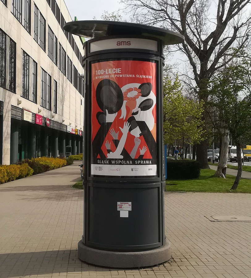 plakat widniejący na słupie we Wrocławiu